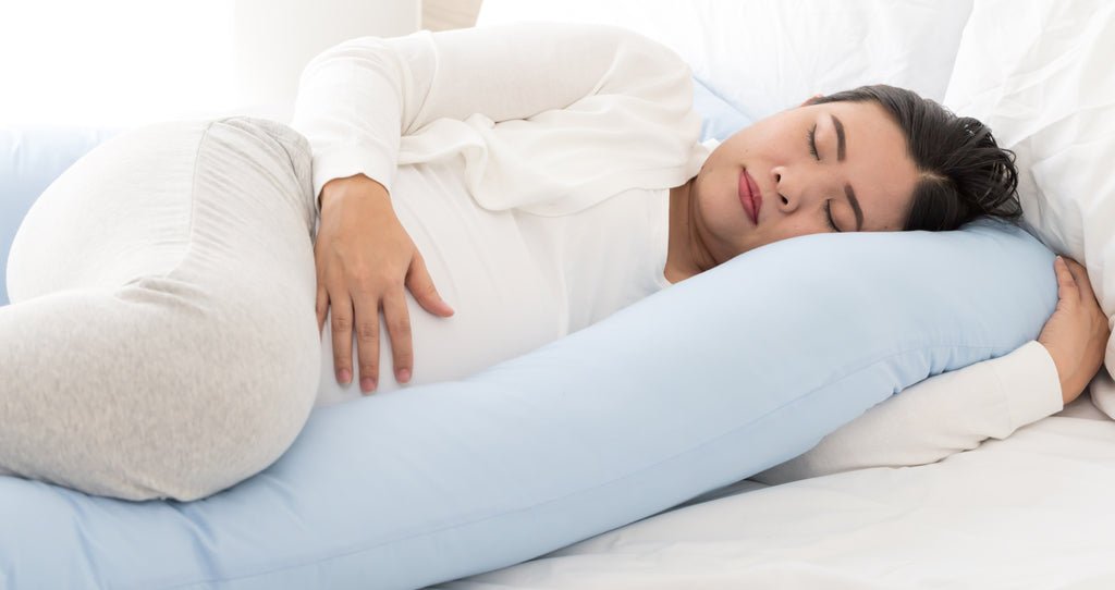Learn How To Use A Pregnancy Pillow To Promote Better Sleep